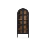 James ashwood display cabinet with black frame, walnut interior and glass doors in tall arched design.