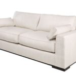 Metro Gent three seater sofa in neutral fabric with black legs and modern contemporary design.
