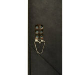 Tall rectangular wall mirror with black and silver natural wood frame, bevelled corners, and reflective centre glass for elegant classical interior décor.