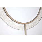 Tall rectangular wall mirror with antique silver circular accents, intersecting light wood frame, and geometric mid-century modern design for elegant interiors.