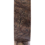 Abstract forest green marble sculpture with circular cut-out and cylindrical base, designed as a luxury decorative accent for modern interiors.