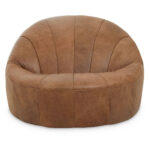 Light brown leather cocoon lounge chair with pleated upholstery and curved design, offering stylish and comfortable seating for modern interiors.