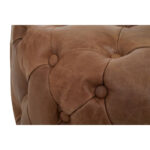 Round tufted leather ottoman in vintage brown with button detailing and cushioned top, designed for classic and rustic interior seating.