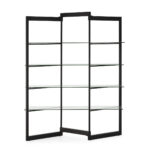 ARMIN Black Shelving Unit with black metal frame and tempered glass shelves used as a modern room divider in a contemporary interior.