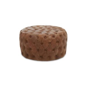 Round tufted leather ottoman in vintage brown with button detailing and cushioned top, designed for classic and rustic interior seating.
