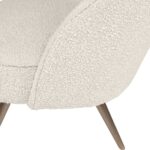 Cream bouclé accent chair with curved backrest and brushed bronze stainless steel legs, designed for modern luxury interior seating.