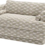 Luxury two seater sofa upholstered in LIZZO Escala patterned fabric with deep seat cushions, cylindrical accent bolsters, and elegant modern styling.